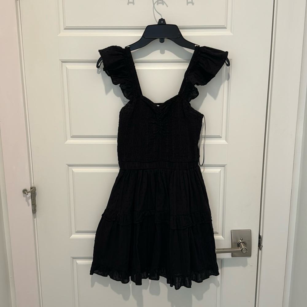 Black ruffle sleeve dress